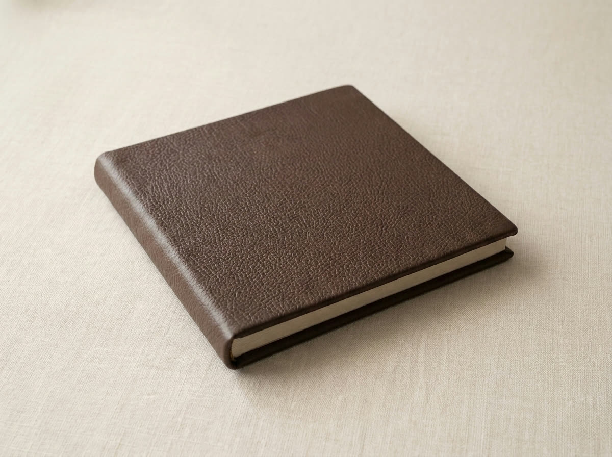 Closed album in Walnut pebbled leather on linen
